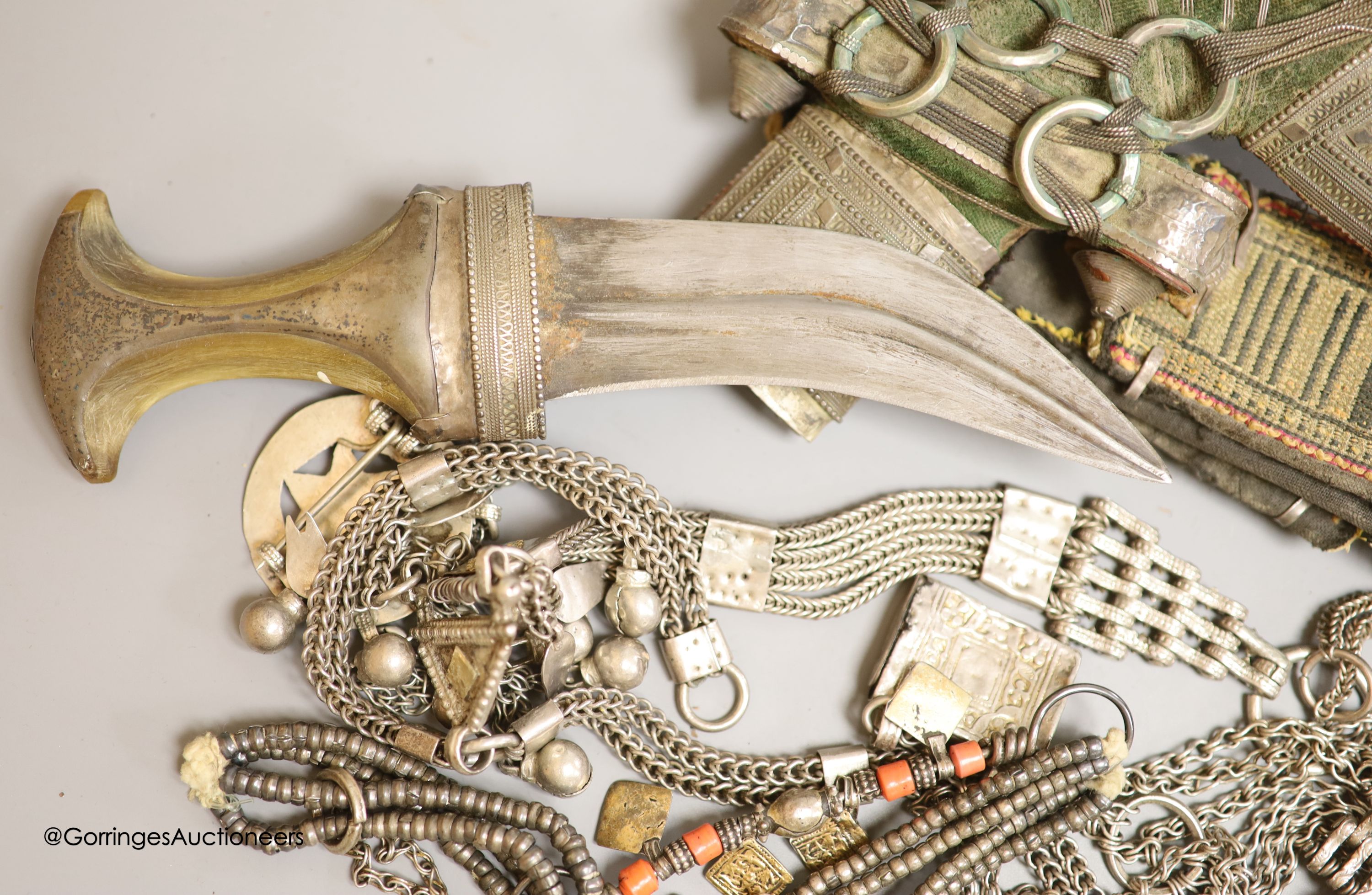 An Arab white metal Jambiya and a group of mainly Arab white metal items